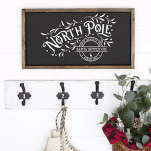 Load image into Gallery viewer, North Pole Santa Supply Company Painted Wood Sign Black Board White Lettering