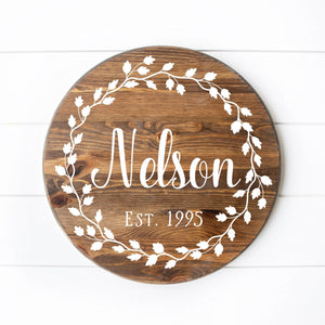 Wreath With Name Round Sign 12" Dark Walnut Stain White Lettering