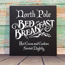 Load image into Gallery viewer, North Pole Bed And Breakfast Small Black Hand Painted Wood Sign