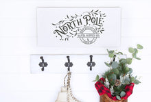 Load image into Gallery viewer, North Pole Santa Supply Company Painted Wood Sign White Board Charcoal Lettering